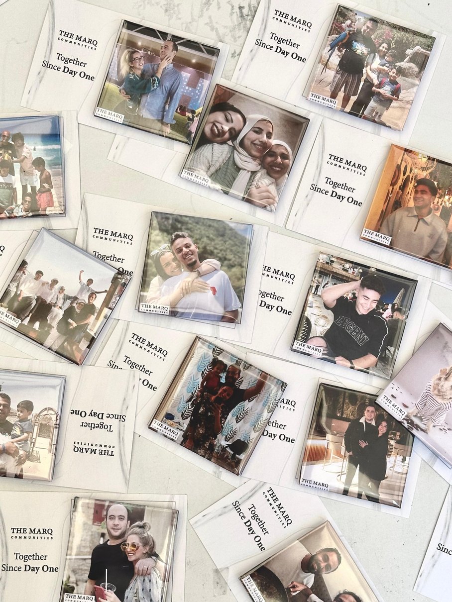 The Marq Communities magnet cards